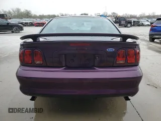 1996 Ford Mustang GT z VIN 1FALP42X8TF196321, wystawiony jako Copart lot #50874885 z przebiegiem 86 945 mil mil oraz Szkoda całkowita • Salvage title. Historia ofert i sprzedaży dostępna na DreamBid. Obrazek 6.