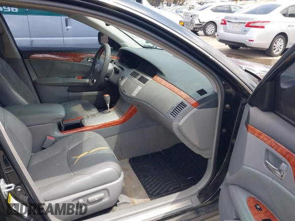 2006 Toyota Avalon XL with VIN 4T1BK36B26U134180, listed as a IAAI auction lot 42128863 with 162,177 mi miles. Bid and sale history available at carsss.com. Image 5.