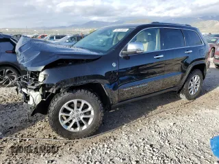 2014 Jeep Grand Cherokee Limited z VIN 1C4RJFBG0EC198831, wystawiony jako Copart lot #56744855 z przebiegiem 123 554 mil mil oraz Szkoda całkowita • Salvage title. Historia ofert i sprzedaży dostępna na DreamBid. Obrazek 1.