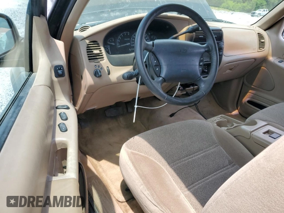 2000 Ford Explorer Sport with VIN 1FMYU60E8YUB03494, listed as a Copart auction lot 59266395 with 210,925 mi miles and Salvage title. Bid and sale history available at DreamBid. Image 8.