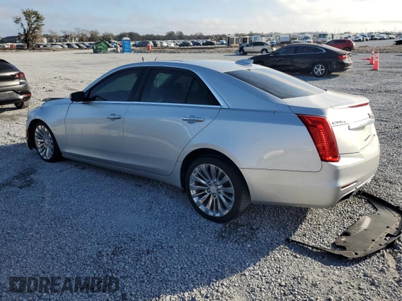 2016 Cadillac CTS Luxury Collection AWD with VIN 1G6AX5SX4G0101062, listed as a Copart auction lot 45140335 with 77,591 mi miles and Salvage Title. Bid and sale history available at DreamBid. Image 2.