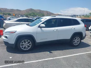 2015 Jeep Cherokee Latitude with VIN 1C4PJLCB7FW790865, listed as a IAAI auction lot 42182034 with 161,642 mi miles and . Bid and sale history available at carsss.com. Image 14.