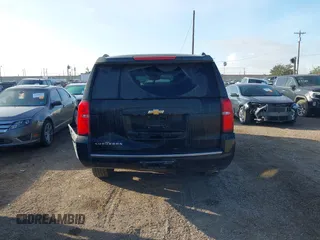 2016 Chevrolet Suburban LTZ with VIN 1GNSCJKC9GR212874, listed as a IAAI auction lot 41125926 with 82,714 mi miles and . Bid and sale history available at DreamBid. Image 16.
