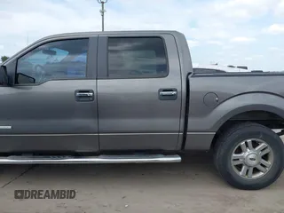 2013 Ford F-150 XL with VIN 1FTFW1CTXDFA78857, listed as a IAAI auction lot 42416880 with 215,031 mi miles and . Bid and sale history available at DreamBid. Image 13.