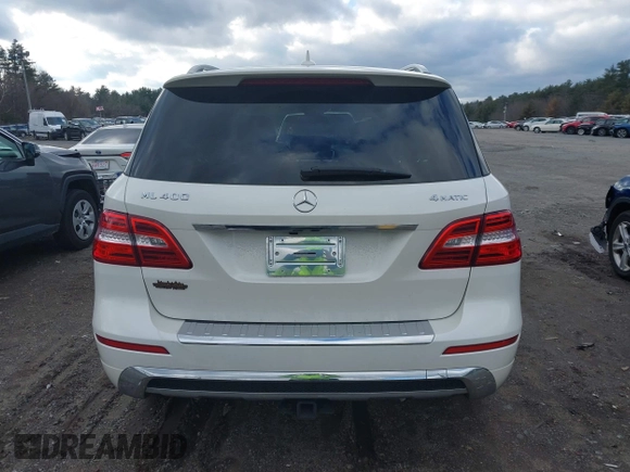 2015 Mercedes-Benz M 400 with VIN 4JGDA5GB3FA534787, listed as a IAAI auction lot 41084917 with 116,325 mi miles and . Bid and sale history available at DreamBid. Image 16.