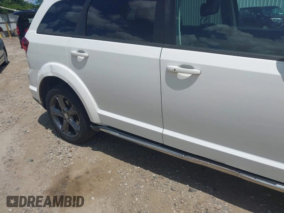 2015 Dodge Journey Crossroad with VIN 3C4PDCGB7FT723142, listed as a IAAI auction lot 42533562 with 217,413 mi miles and . Bid and sale history available at DreamBid. Image 13.