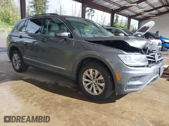 2018 Volkswagen Tiguan SEL with VIN 3VV3B7AX6JM054849, listed as a IAAI auction lot 42303112 with 87,574 mi miles and . Bid and sale history available at DreamBid. Image 1.