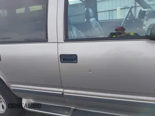 1999 GMC Yukon with VIN 1GKEK13R2XJ712390, listed as a IAAI auction lot 41793649 with 222,721 mi miles. Bid and sale history available at carsss.com. Image 14.