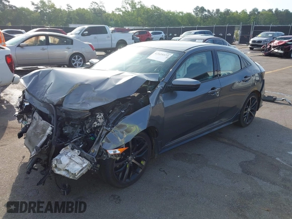 2021 Honda Civic Sport with VIN SHHFK7H44MU217741, listed as a IAAI auction lot 42029373 with 68,572 mi miles and . Bid and sale history available at DreamBid. Image 2.