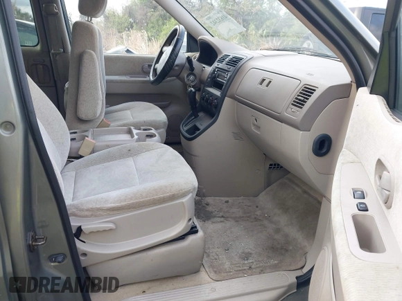 2004 Kia Sedona LX with VIN KNDUP131346533373, listed as a IAAI auction lot 41632342 with 76,545 mi miles. Bid and sale history available at carsss.com. Image 5.
