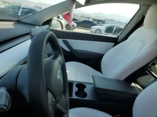 2022 Tesla Model Y Long Range with VIN 7SAYGDEE3NF318359, listed as a Copart auction lot 51861925 with 0 mi miles and Salvage Title. Bid and sale history available at carsss.com. Image 8.