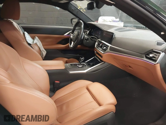 2022 BMW 4 Series 430i xDrive with VIN WBA73AP04NCK88044, listed as a IAAI auction lot 41577730 with 28,907 mi miles and . Bid and sale history available at DreamBid. Image 5.