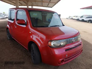 2011 Nissan Cube S z VIN JN8AZ2KR3BT207179, wystawiony jako IAAI lot #42154453 z przebiegiem 170 467 mil mil oraz . Historia ofert i sprzedaży dostępna na DreamBid. Obrazek 1.