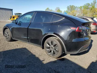 2024 Tesla Model Y Long Range z VIN 7SAYGAEE6RF106267, wystawiony jako Copart lot #53386675 z przebiegiem 8454 mil mil oraz Szkoda całkowita • Salvage title. Historia ofert i sprzedaży dostępna na DreamBid. Obrazek 2.