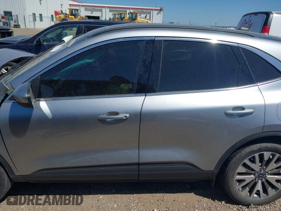2021 Ford Escape Titanium Hybrid z VIN 1FMCU0DZ3MUB04065, wystawiony jako IAAI lot #41764797 z przebiegiem 28 881 mil mil oraz . Historia ofert i sprzedaży dostępna na DreamBid. Obrazek 15.