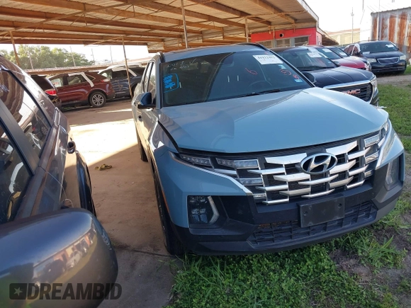 2022 Hyundai Santa Cruz SEL Premium z VIN 5NTJDDAF3NH012433, wystawiony jako IAAI lot #41922462 z przebiegiem 72 880 mil mil oraz . Historia ofert i sprzedaży dostępna na DreamBid. Obrazek 1.