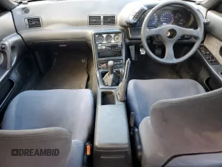 1990 Nissan Skyline z VIN HCR32080128, wystawiony jako Copart lot #77564184 z przebiegiem 96 455 mil mil oraz Szkoda całkowita • Salvage title. Historia ofert i sprzedaży dostępna na DreamBid. Obrazek 8.