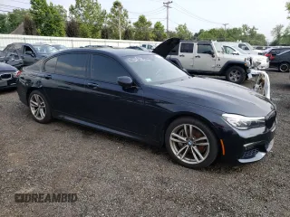 2018 BMW 7 Series 740e xDrive with VIN WBA7J2C57JG938291, listed as a Copart auction lot 58337763 with 53,259 mi miles and . Bid and sale history available at DreamBid. Image 4.