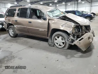 2003 GMC Envoy SLT with VIN 1GKET16S236202968, listed as a Copart auction lot 47180024 with Not Provided miles and Non Repairable. Bid and sale history available at DreamBid. Image 4.