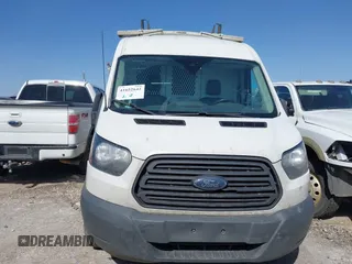 2018 Ford Transit with VIN 1FTYE1CMXJKA35806, listed as a IAAI auction lot 41652642 with 200,828 mi miles and . Bid and sale history available at DreamBid. Image 12.