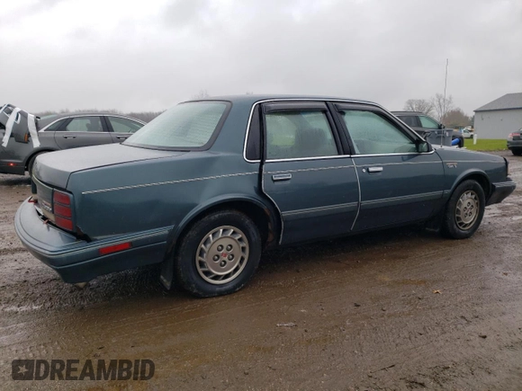 1996 Oldsmobile Cutlass Ciera 1SA VX5 z VIN 1G3AJ55M2T6382818, wystawiony jako Copart lot #80290114 z przebiegiem 137 463 mil mil oraz Szkody całkowita. Historia ofert i sprzedaży dostępna na DreamBid. Obrazek 3.