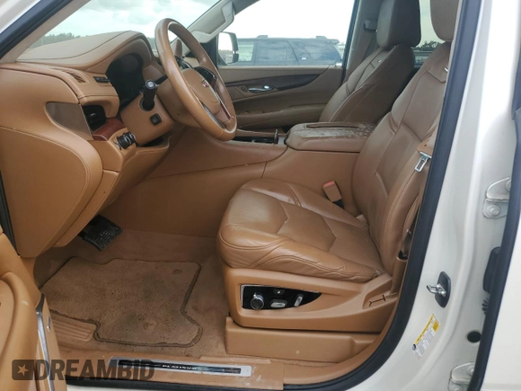 2015 Cadillac Escalade Platinum z VIN 1GYS4PKJ5FR574930, wystawiony jako Copart lot #74691204 z przebiegiem Nie podano mil oraz Szkoda całkowita • Salvage title. Historia ofert i sprzedaży dostępna na DreamBid. Obrazek 7.