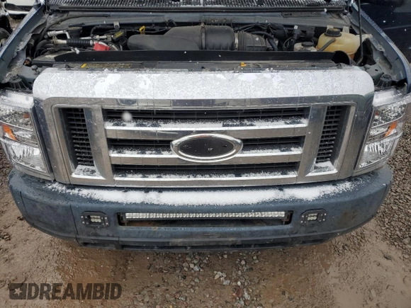2012 Ford Econoline Passenger XL with VIN 1FBNE3BL7CDB17804, listed as a Copart auction lot 84530704 with 97,834 mi miles and Salvage title. Bid and sale history available at DreamBid. Image 12.