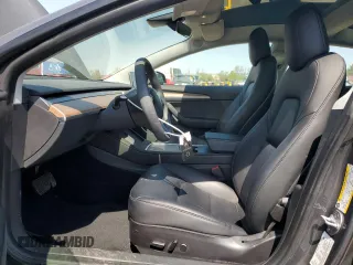 2023 Tesla Model 3 Long Range with VIN 5YJ3E1EB2PF389041, listed as a Copart auction lot 53450725 with 27,060 mi miles and Salvage Title. Bid and sale history available at DreamBid. Image 7.