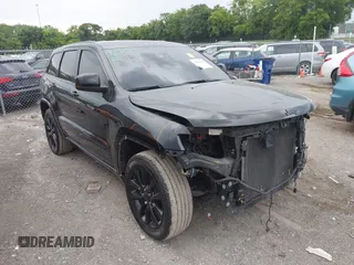 2020 Jeep Grand Cherokee Laredo E with VIN 1C4RJEAG7LC324904, listed as a IAAI auction lot 42600961 with 93,444 mi miles and . Bid and sale history available at DreamBid. Image 1.
