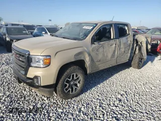 2022 GMC Canyon 4WD AT4 z VIN 1GTG6FENXN1283495, wystawiony jako Copart lot #52314845 z przebiegiem 27 460 mil mil oraz Szkoda całkowita • Salvage title. Historia ofert i sprzedaży dostępna na DreamBid. Obrazek 1.