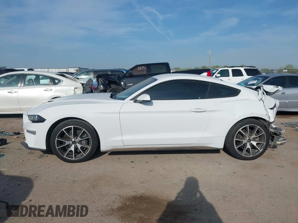 2021 Ford Mustang EcoBoost z VIN 1FA6P8TD5M5133239, wystawiony jako IAAI lot #41899042 z przebiegiem 65 553 mil mil oraz . Historia ofert i sprzedaży dostępna na DreamBid. Obrazek 14.