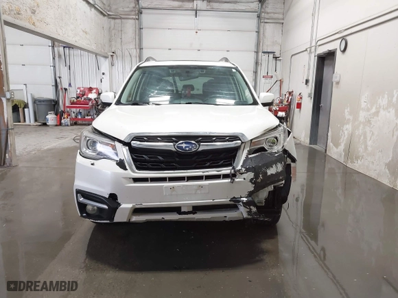 2018 Subaru Forester Touring with VIN JF2SJAWC8JH463943, listed as a IAAI auction lot 41611230 with 65,444 mi miles. Bid and sale history available at carsss.com. Image 12.