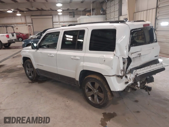 2014 Jeep Patriot Latitude with VIN 1C4NJPFA3ED739925, listed as a IAAI auction lot 41623546 with 130,374 mi miles and . Bid and sale history available at carsss.com. Image 3.