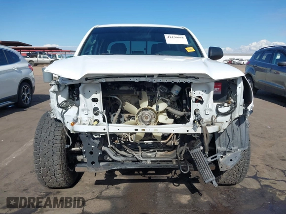 2014 Toyota Tacoma with VIN 3TMMU4FN9EM062808, listed as a IAAI auction lot 41450058 with 192,628 mi miles and . Bid and sale history available at DreamBid. Image 13.