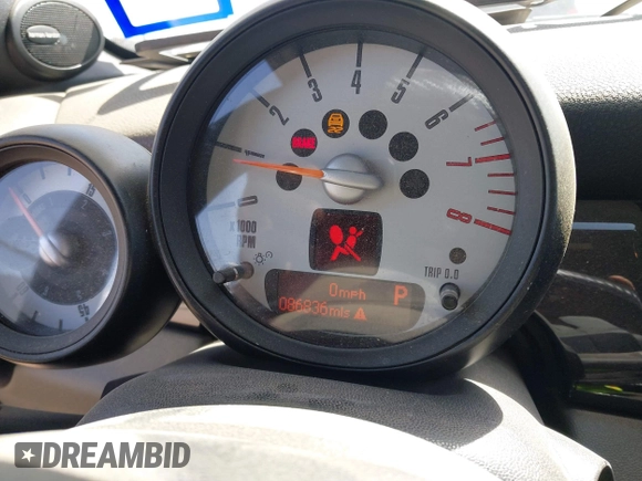 2012 MINI Roadster S with VIN WMWSY3C56CT144520, listed as a IAAI auction lot 41818205 with 86,836 mi miles and . Bid and sale history available at DreamBid. Image 7.