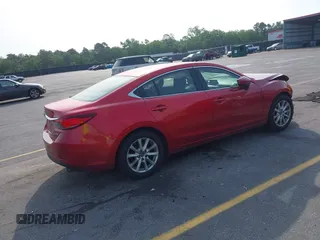 2016 Mazda 6 i Sport with VIN JM1GJ1U56G1409616, listed as a IAAI auction lot 42067647 with 158,180 mi miles and . Bid and sale history available at DreamBid. Image 4.