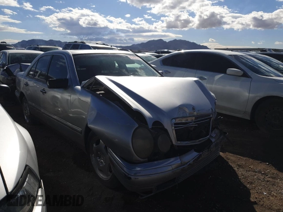 1998 Mercedes-Benz E with VIN WDBJF70F7WA605103, listed as a Copart auction lot 42458545 with 189,082 mi miles and Salvage Title. Bid and sale history available at DreamBid. Image 4.