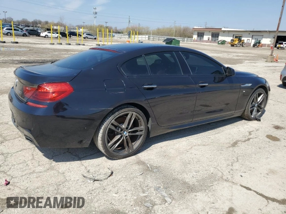 2014 BMW 6 Series 650i xDrive z VIN WBA6B4C5XED099250, wystawiony jako Copart lot #52734845 z przebiegiem Nie podano mil oraz Czysty tytuł • Clean title. Historia ofert i sprzedaży dostępna na DreamBid. Obrazek 3.