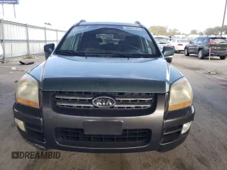 2005 Kia Sportage LX with VIN KNDJF723957135799, listed as a Copart auction lot 76531124 with 278,886 mi miles and Clean Title. Bid and sale history available at carsss.com. Image 5.