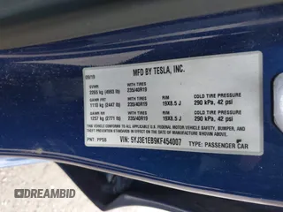 2019 Tesla Model 3 Long Range with VIN 5YJ3E1EB9KF454007, listed as a IAAI auction lot 41769346 with 141,609 mi miles. Bid and sale history available at carsss.com. Image 9.