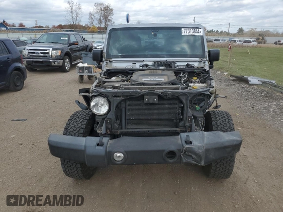 2018 Jeep Wrangler JK Unlimited Sport S with VIN 1C4BJWDG2JL908286, listed as a Copart auction lot 77313844 with 69,497 mi miles and Salvage Title. Bid and sale history available at carsss.com. Image 5.