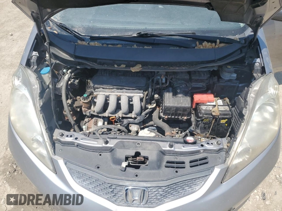 2009 Honda Fit Sport with VIN JHMGE88449S012139, listed as a Copart auction lot 60046185 with 255,292 mi miles and Clean title. Bid and sale history available at DreamBid. Image 11.