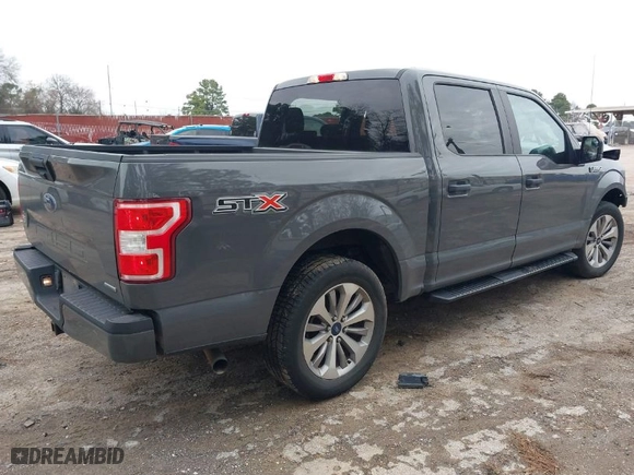 2018 Ford F-150 XL with VIN 1FTEW1CP4JFD00156, listed as a IAAI auction lot 41571979 with 153,167 mi miles. Bid and sale history available at carsss.com. Image 4.