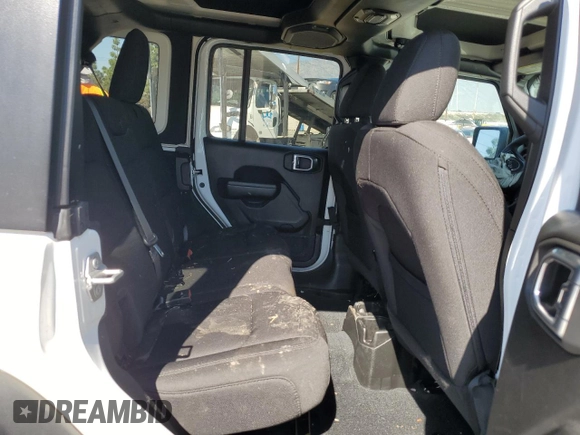 2023 Jeep Wrangler Sport Altitude with VIN 1C4HJXDG3PW623930, listed as a Copart auction lot 46733035 with 26,032 mi miles and Salvage Title. Bid and sale history available at DreamBid. Image 12.