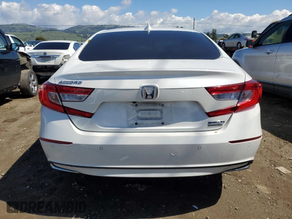 2018 Honda Accord Touring z VIN 1HGCV3F93JA011514, wystawiony jako Copart lot #51708765 z przebiegiem 101 202 mil mil oraz Szkoda całkowita • Salvage title. Historia ofert i sprzedaży dostępna na DreamBid. Obrazek 6.