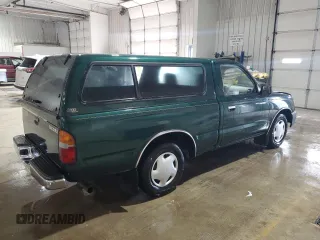 1999 Toyota Tacoma with VIN 4TANL42N4XZ453505, listed as a Copart auction lot 63399325 with 175,198 mi miles and Salvage title. Bid and sale history available at DreamBid. Image 3.