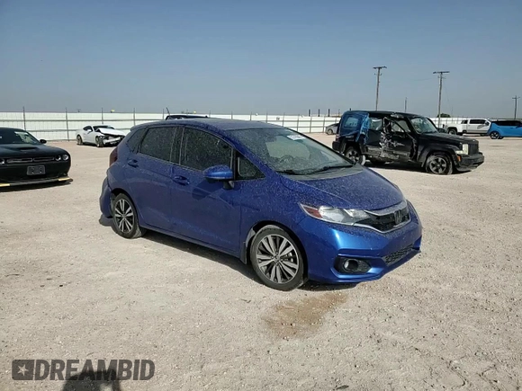 2019 Honda Fit EX z VIN 3HGGK5H82KM739808, wystawiony jako Copart lot #53745645 z przebiegiem 112 697 mil mil oraz Szkoda całkowita • Salvage title. Historia ofert i sprzedaży dostępna na DreamBid. Obrazek 14.