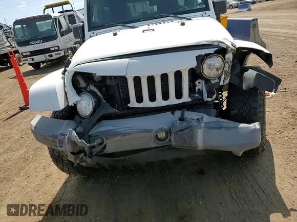 2014 Jeep Wrangler Unlimited Sahara with VIN 1C4BJWEG1EL210949, listed as a Copart auction lot 60977555 with 122,495 mi miles and Salvage title. Bid and sale history available at DreamBid. Image 14.