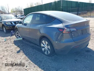 2022 Tesla Model Y Long Range with VIN 7SAYGDEE2NF460945, listed as a IAAI auction lot 41921645 with 62,318 mi miles and . Bid and sale history available at DreamBid. Image 3.