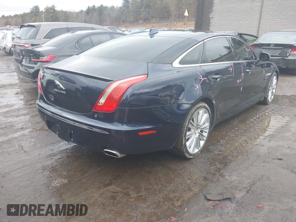 2015 Jaguar XJ Portfolio with VIN SAJWJ2GD0F8V83497, listed as a IAAI auction lot 41697285 with 52,311 mi miles and . Bid and sale history available at DreamBid. Image 4.